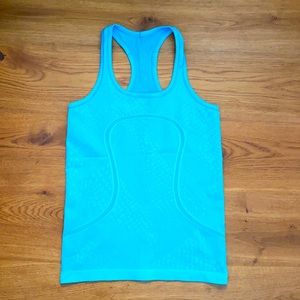 Turquoise like on swiftly tank size 6.